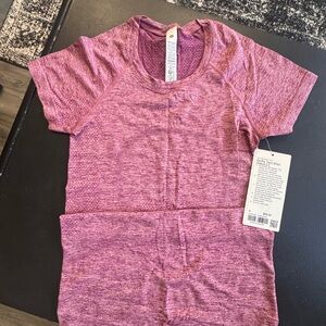 Lululemon swiftly tech short sleeve - hip length Size 4 NWT